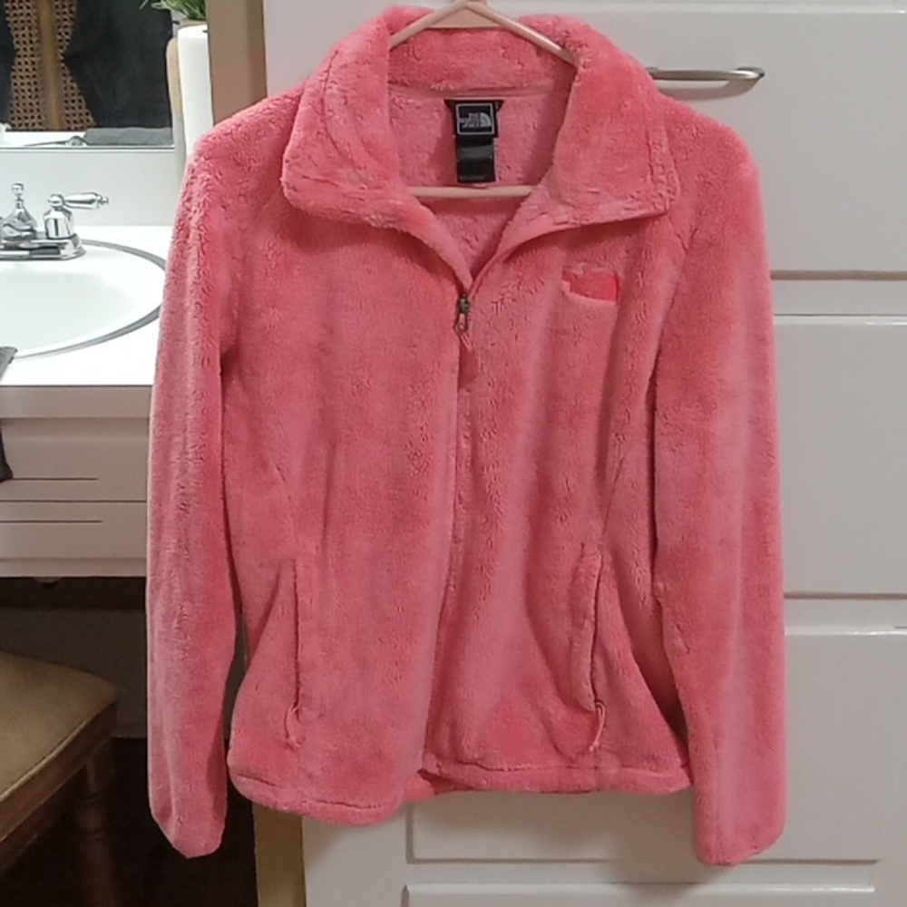 Peach colored The North Face jacket. Size M